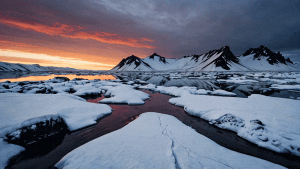 Document the seasonal changes in Iceland's landscapes, from the vibrant hues of summer's midnight sun to the snow-covered vistas of winter, capturing the raw and ever-changing beauty of nature.